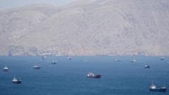 US threatens shipping firms with sanctions if they pay Iran tolls