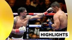 Usyk earns controversial knockout win to retain titles